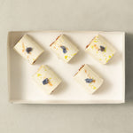 Coffret desserts des Fêtes - Bûchette citron, verveine et praliné au chocolat-AvecPlaisirs Chefs Traiteurs