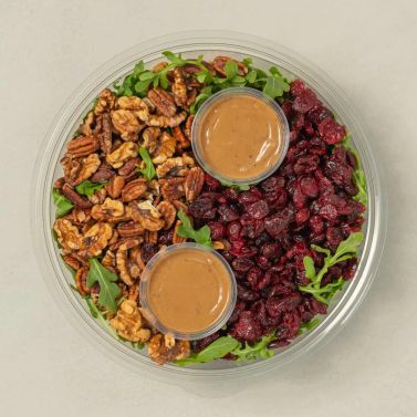 Arugula salad with cranberries and nuts